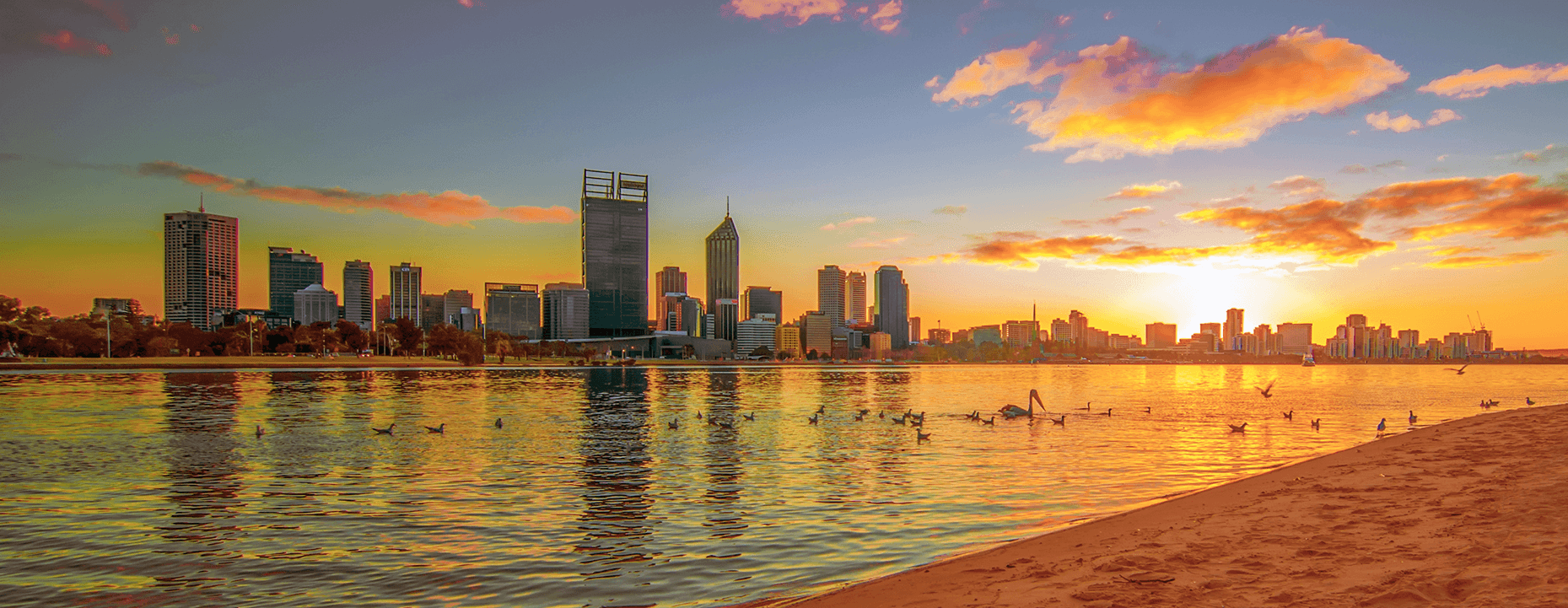 View of the Perth cityscape from the bank of Swan River